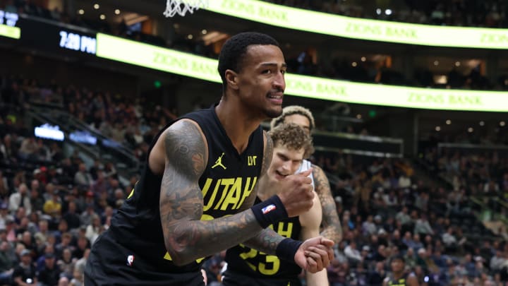 Mar 27, 2024; Salt Lake City, Utah, USA; Utah Jazz forward John Collins (20) reacts to a call against the San Antonio Spurs during the first quarter at Delta Center. Mandatory Credit: Rob Gray-USA TODAY Sports