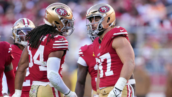 Nov 19, 2023; Santa Clara, California, USA; San Francisco 49ers linebacker Fred Warner (left) talks with defensive end Nick Bosa (right) during the fourth quarter against the Tampa Bay Buccaneers at Levi's Stadium. Mandatory Credit: Darren Yamashita-USA TODAY Sports