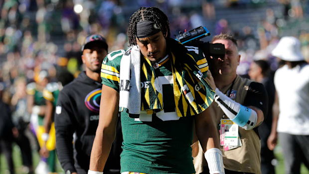 Green Bay Packers quarterback Jordan Love (10) leaves the field after a 31–29 loss to the Minnesota Vikings.