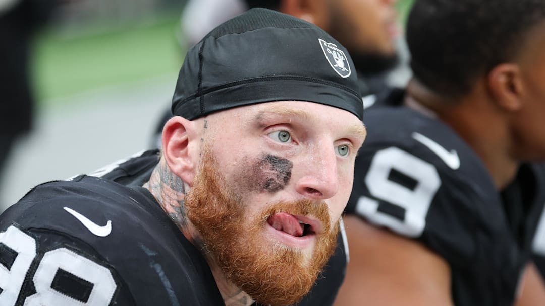 Sep 28, 2025; Paradise, Nevada, USA; Las Vegas Raiders defensive end Maxx Crosby (98) looks on from the sideline during the first quarter against the Chicago Bears at Allegiant Stadium. Mandatory Credit: Kiyoshi Mio-Imagn Images