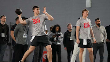 Mar 20, 2024; Columbus, Ohio, USA; Ohio State Buckeyes quarterback Will Howard makes a throw beside quarterback Devin Brown during Pro Day at the Woody Hayes Athletic Center.