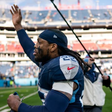 Tennessee Titans running back Derrick Henry (22) waves to fans as he exits the field after defeating Jacksonville Jaguars 28-20 at Nissan Stadium in Nashville, Tenn., Sunday, Jan. 7, 2024.