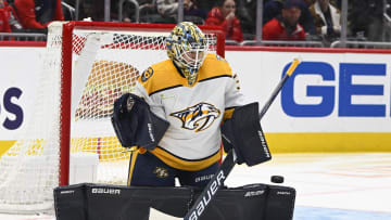 Dec 30, 2023; Washington, District of Columbia, USA; Nashville Predators goaltender Yaroslav Askarov (30) makes a save against the Washington Capitals during the first period at Capital One Arena. Mandatory Credit: Brad Mills-USA TODAY Sports