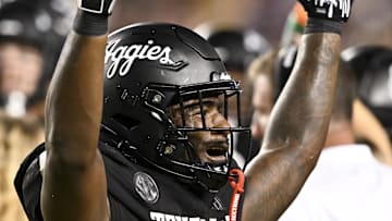 Oct 26, 2024; College Station, Texas, USA; Texas A&M Aggies running back Le'Veon Moss (8) reacts against the LSU Tigers during the third quarter. The Aggies defeated the Tigers 38-23; at Kyle Field. Mandatory Credit: Maria Lysaker-Imagn Images. 