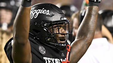 Oct 26, 2024; College Station, Texas, USA; Texas A&M Aggies running back Le'Veon Moss (8) reacts against the LSU Tigers during the third quarter. The Aggies defeated the Tigers 38-23; at Kyle Field. Mandatory Credit: Maria Lysaker-Imagn Images. 