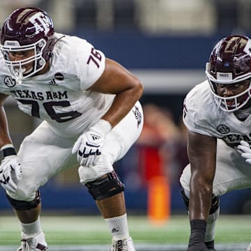 Texas A&M Aggies offensive lineman Reuben Fatheree II (76) in action during the game between the Arkansas Razorbacks and the Texas A&M Aggies at AT&T Stadium.