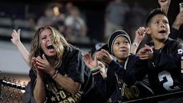 Antoinette Padilla, mother of Vanderbilt quarterback Diego Pavia, celebrates after he scored a touchdown against Kentucky during the third quarter at FirstBank Stadium in Nashville, Tenn., Saturday, Nov. 22, 2025.