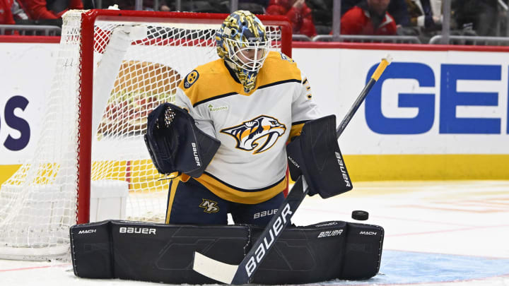 Dec 30, 2023; Washington, District of Columbia, USA; Nashville Predators goaltender Yaroslav Askarov (30) makes a save against the Washington Capitals during the first period at Capital One Arena. Mandatory Credit: Brad Mills-USA TODAY Sports