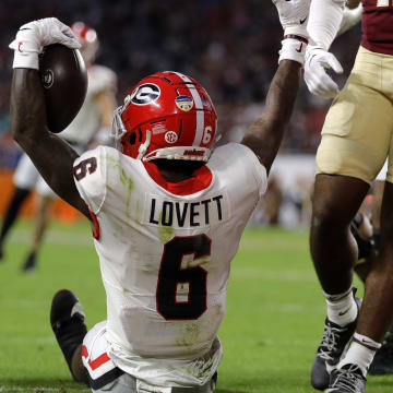 Dec 30, 2023; Miami Gardens, FL, USA; Georgia Bulldogs wide receiver Dominic Lovett (6) reacts after scoring a touchdown against the Florida State Seminoles during the first half in the 2023 Orange Bowl at Hard Rock Stadium. Mandatory Credit: Sam Navarro-USA TODAY Sports