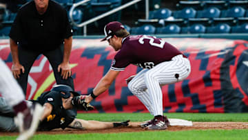 Missouri State's Taeg Gollert tags out Mizzou's Brock Daniels in a pickoff as the Bears took on the Tigers at Hammons Field on Tuesday, April 22, 2025.