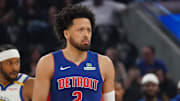 Mar 8, 2025; San Francisco, California, USA; Detroit Pistons guard Cade Cunningham (2) and Golden State Warriors guard Moses Moody (4) wait for play to resume in the first quarter at Chase Center. Mandatory Credit: David Gonzales-Imagn Images