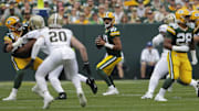 Green Bay Packers quarterback Jordan Love looks to pass against the New Orleans Saints last season.