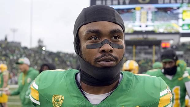 Oregon Ducks Tampa Bay Buccaneers Bucky Irving Injury Baker Mayfield College Football NFC South Big Ten NFL Draft Cardinals 
