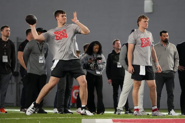 Quarterbacks throw during Pro Day.