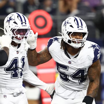 Dallas Cowboys defensive end Donovan Ezeiruaku celebrates after a sack against the Washington Commanders 