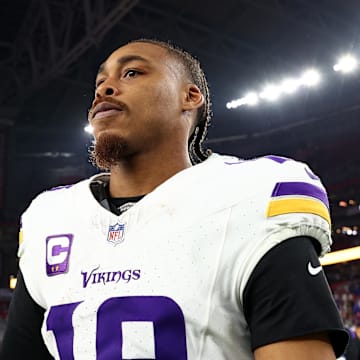 Jan 13, 2025; Glendale, AZ, USA; Minnesota Vikings wide receiver Justin Jefferson (18) reacts after the  NFC wild card game against the Los Angeles Rams at State Farm Stadium. Mandatory Credit: Mark J. Rebilas-Imagn Images