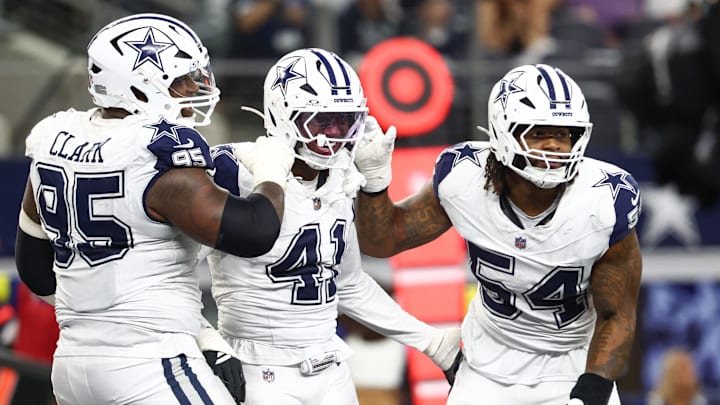 Oct 19, 2025; Arlington, Texas, USA; Dallas Cowboys defensive end Donovan Ezeiruaku (41) celebrates after a sack against the Washington Commanders during the fourth quarter of the game at AT&T Stadium. Mandatory Credit: Kevin Jairaj-Imagn Images