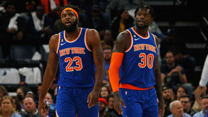 Oct 19, 2022; Memphis, Tennessee, USA; New York Knicks center Mitchell Robinson (23) and New York Knicks forward Julius Randle (30) walk up court during the first half against the Memphis Grizzlies at FedExForum. Mandatory Credit: Petre Thomas-USA TODAY Sports