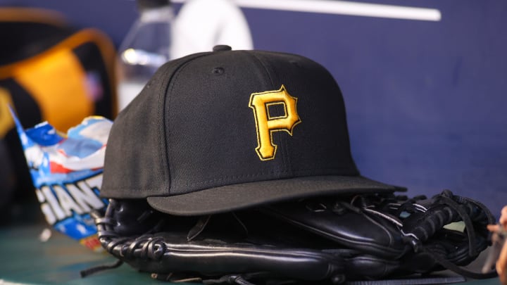 Sep 8, 2023; Atlanta, Georgia, USA; A detailed view of a Pittsburgh Pirates hat and glove before a game against the Pittsburgh Pirates in the first inning at Truist Park. Mandatory Credit: Brett Davis-USA TODAY Sports