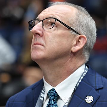 Mar 17, 2024; Nashville, TN, USA;  SEC commissioner Greg Sankey looks on before the SEC Tournament championship game between the Florida Gators and the Auburn Tigers at Bridgestone Arena. Mandatory Credit: Christopher Hanewinckel-Imagn Images