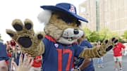 Sep 9, 2017; Tucson, AZ, USA; Arizona Wildcats mascot Wilbur high fives fans before the game against the Houston Cougars at Arizona Stadium. Mandatory Credit: Casey Sapio-Imagn Images
