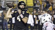 Appalachian State Mountaineers quarterback Joey Aguilar throws a pass over South Alabama Jaguars linebacker Aakil Washington during the second half at Kidd Brewer Stadium. 