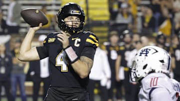 Appalachian State Mountaineers quarterback Joey Aguilar throws a pass over South Alabama Jaguars linebacker Aakil Washington during the second half at Kidd Brewer Stadium. 