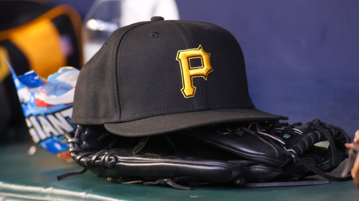 Sep 8, 2023; Atlanta, Georgia, USA; A detailed view of a Pittsburgh Pirates hat and glove before a game against the Pittsburgh Pirates in the first inning at Truist Park. Mandatory Credit: Brett Davis-USA TODAY Sports