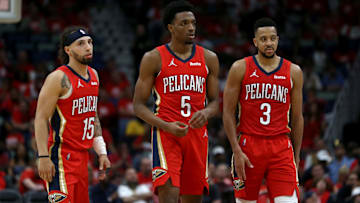 Apr 22, 2022; New Orleans, Louisiana, USA; New Orleans Pelicans guard Jose Alvarado (15) and forward Herbert Jones (5) and guard CJ McCollum (3) in the second half of game three of the first round for the 2022 NBA playoffs at the Smoothie King Center against the Phoenix Suns. The Suns won, 114-111.