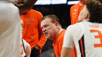 Mar 23, 2024; Omaha, NE, USA; Illinois Fighting Illini head coach Brad Underwood leads a team huddle