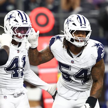 Dallas Cowboys defensive end Donovan Ezeiruaku celebrates after a sack against the Washington Commanders.