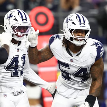 Dallas Cowboys defensive end Donovan Ezeiruaku celebrates after a sack against the Washington Commanders.