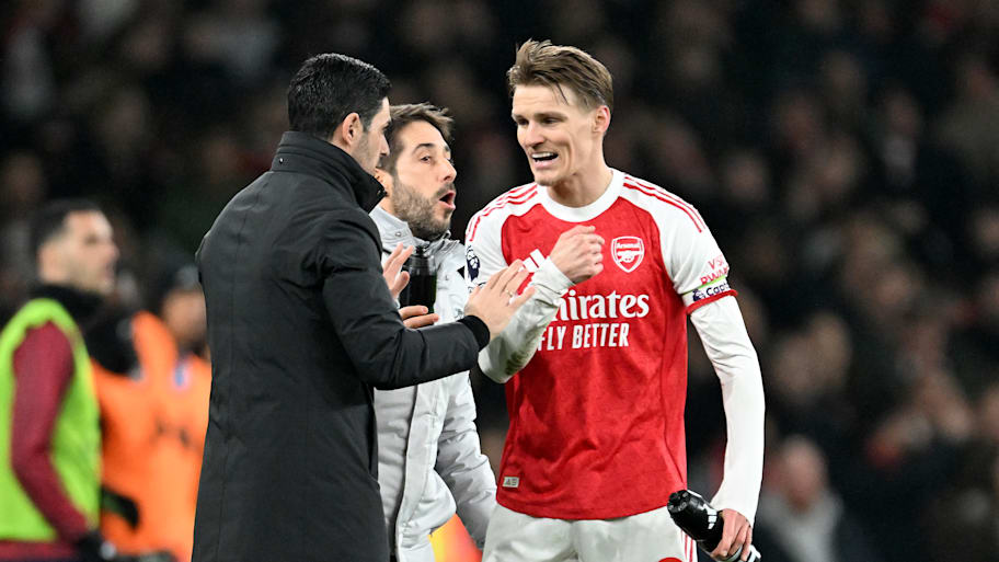Mikel Arteta (left) and Martin Ødegaard.