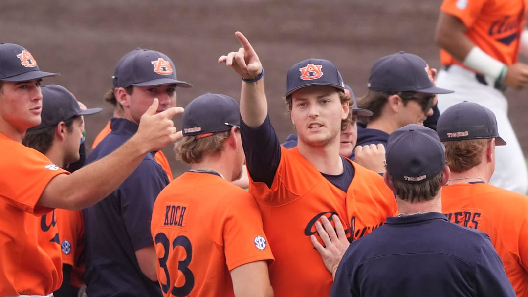 Auburn's Cade Fisher (3) points into the stands after the win over Tennessee in game 3 of the an NCAA baseball game series on May 4, 2025, in Knoxville, Tenn.