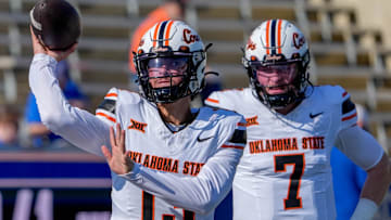 Oklahoma State quarterback Garret Rangel (13) warms up before an NCAA football game between Oklahoma State and Tulsa in Tulsa, Okla., on Saturday, Sept. 14, 2024.