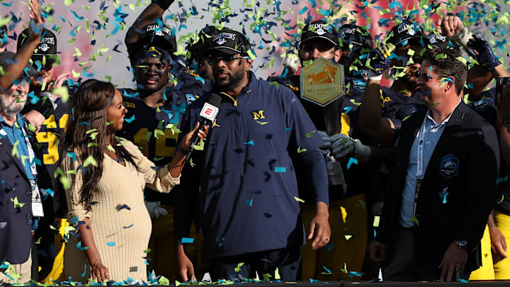 Dec 31, 2024; Tampa, FL, USA; Michigan Wolverines head coach Sherrone Moore celebrates after beating the Alabama Crimson Tide in the ReliaQuest Bowl at Raymond James Stadium. Mandatory Credit: Nathan Ray Seebeck-Imagn Images Dec 31, 2024; Tampa, FL, USA; Michigan Wolverines head coach Sherrone Moore celebrates after beating the Alabama Crimson Tide in the ReliaQuest Bowl at Raymond James Stadium. Mandatory Credit: Nathan Ray Seebeck-Imagn Images