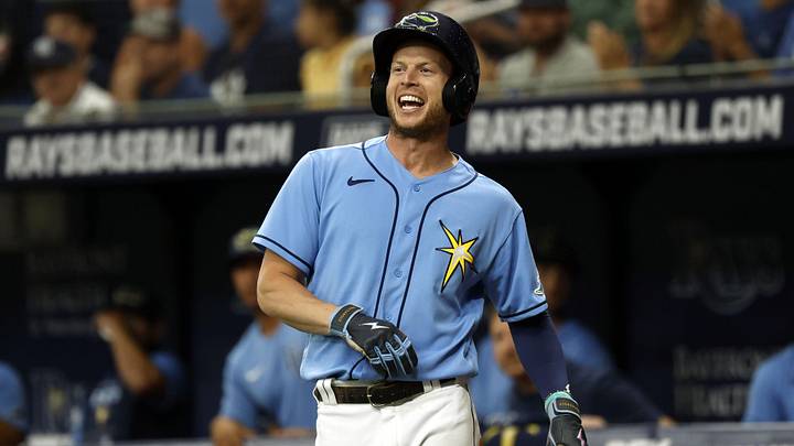 Jun 26, 2022; St. Petersburg, Florida, USA;  Tampa Bay Rays right fielder Brett Phillips (35) smiles after he scores a run against the Pittsburgh Pirates during the seventh inning at Tropicana Field. Mandatory Credit: Kim Klement-Imagn Images