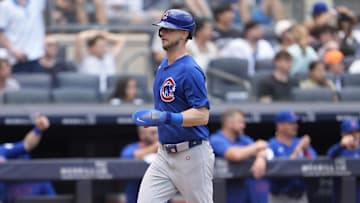 Jul 12, 2025; Bronx, New York, USA; Chicago Cubs right fielder Kyle Tucker (30) scores a run on catcher Carson Kelly (15) (not pictured) RBI single during the third inning at Yankee Stadium. Mandatory Credit: Gregory Fisher-Imagn Images