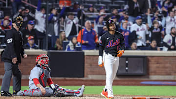 Apr 18, 2025; New York City, New York, USA;  New York Mets shortstop Francisco Lindor (12) hits a game winning solo home run in the ninth inning against the St. Louis Cardinals at Citi Field. Mandatory Credit: Wendell Cruz-Imagn Images