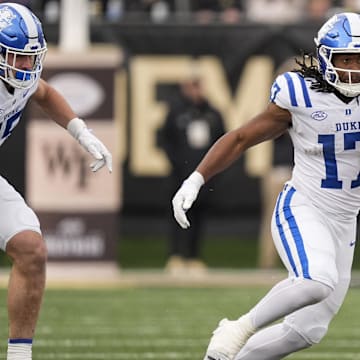 Nov 30, 2024; Winston-Salem, North Carolina, USA; Duke Blue Devils running back Star Thomas (17) runs for yardage against the Wake Forest Demon Deacons during the second half at Allegacy Federal Credit Union Stadium. Mandatory Credit: Jim Dedmon-Imagn Images