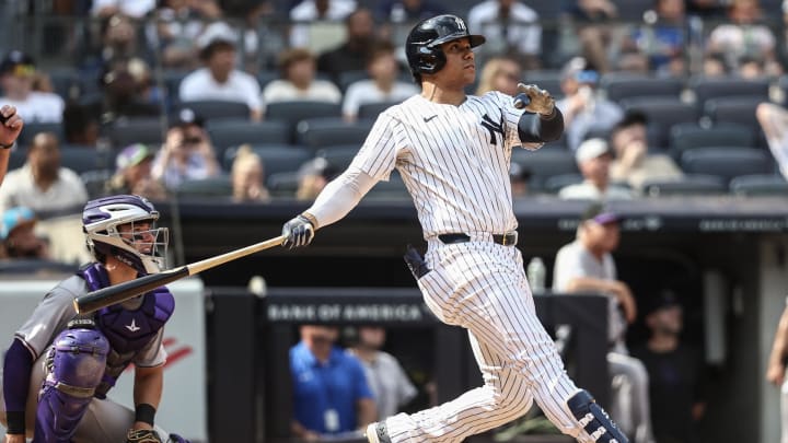 Aug 25, 2024; Bronx, New York, USA;  New York Yankees right fielder Juan Soto (22) hits a solo home run in the seventh inning against the Colorado Rockies at Yankee Stadium. Mandatory Credit: Wendell Cruz-USA TODAY Sports