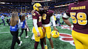 Jan 1, 2025; Atlanta, GA, USA; Arizona State Sun Devils quarterback Sam Leavitt (10) is consoled by quarterback Jeff Sims (6) after a loss against the Texas Longhorns in the Peach Bowl at Mercedes-Benz Stadium. Mandatory Credit: Brett Davis-Imagn Images