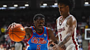 Jan 14, 2025; Tuscaloosa, Alabama, USA; Mississippi Rebels guard Jaylen Murray (5) works against Alabama Crimson Tide guard Aden Holloway (2) during the second half at Coleman Coliseum. Mandatory Credit: Will McLelland-Imagn Images