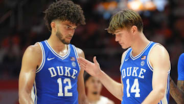 Duke forward Cameron Boozer (12) and guard/forward Nikolas Khamenia (14) 