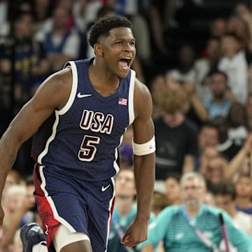 Aug 10, 2024; Paris, France; United States guard Anthony Edwards (5) reacts against France in the second half in the men's basketball gold medal game during the Paris 2024 Olympic Summer Games at Accor Arena. Mandatory Credit: Kyle Terada-Imagn Images