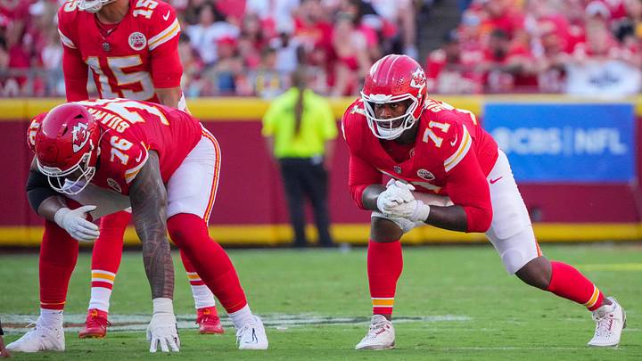 Sep 28, 2025; Kansas City, Missouri, USA; Kansas City Chiefs offensive tackle Kingsley Suamataia (76) and offensive tackle Josh Simmons (71) at the line of scrimmage against the Baltimore Ravens during the game at GEHA Field at Arrowhead Stadium. Mandatory Credit: Denny Medley-Imagn Images