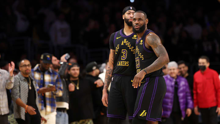 Jan 9, 2024; Los Angeles, California, USA;  Los Angeles Lakers forward LeBron James (23) celebrates a victory with forward Anthony Davis (3) after defeating the Toronto Raptors at Crypto.com Arena. Mandatory Credit: Kiyoshi Mio-USA TODAY Sports