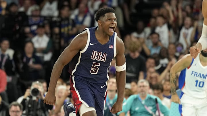 Aug 10, 2024; Paris, France; United States guard Anthony Edwards (5) reacts against France in the second half in the men's basketball gold medal game during the Paris 2024 Olympic Summer Games at Accor Arena. Mandatory Credit: Kyle Terada-Imagn Images