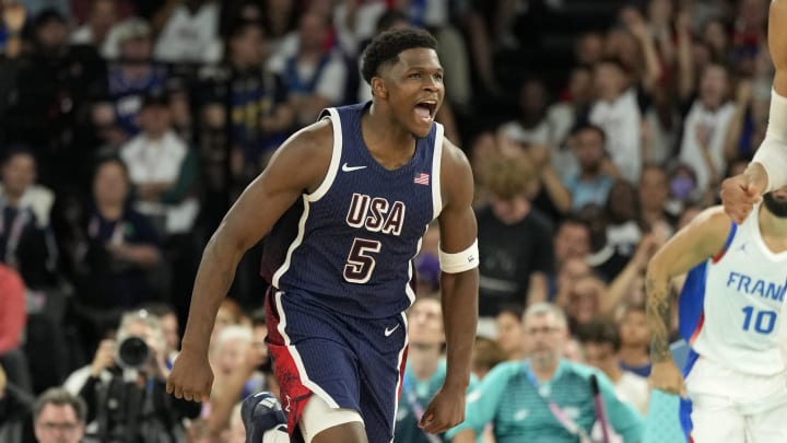 United States guard Anthony Edwards (5) reacts against France in the second half in the men's basketball gold medal game during the Paris 2024 Olympic Summer Games at Accor Arena. Mandatory Credit: