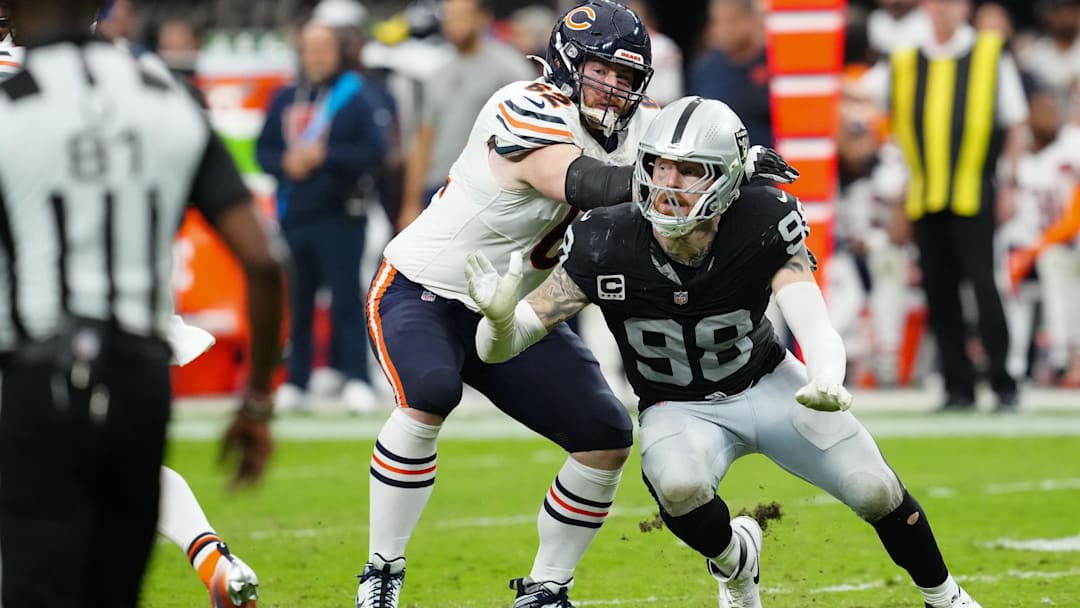 Maxx Crosby slips inside of Joe Thuney in the Bears' 25-24 win at Las Vegas last season.